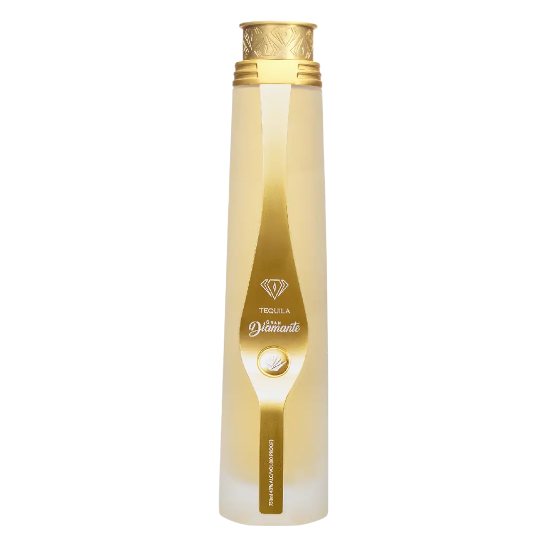 Gran Diamante Reposado Tequila bottle with golden amber tequila and faceted diamond-style design